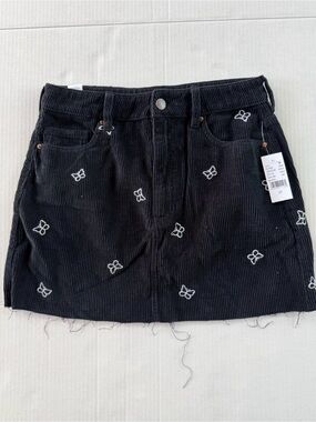 PacSun Black Corduroy Mini Skirt with White Butterfly Embroidery